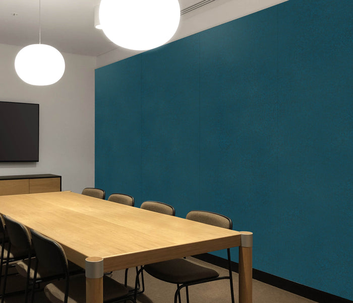 Teal SANA easy stick acoustic wall panels in a meeting room