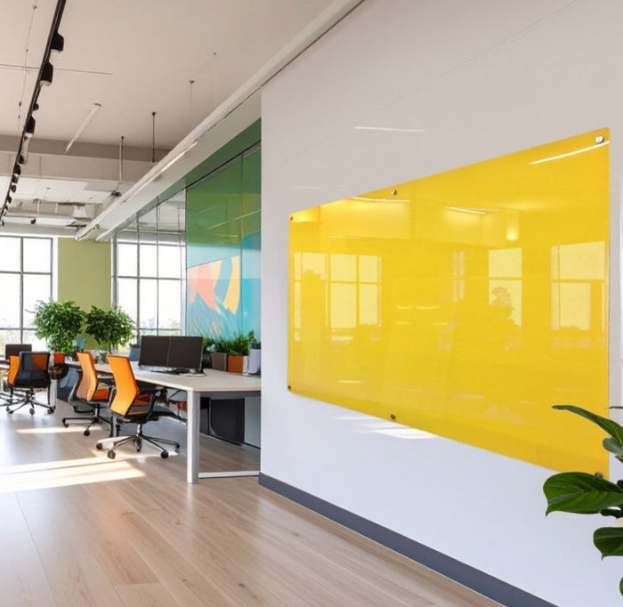 Yellow designer colour glassboard in a bright open plan office