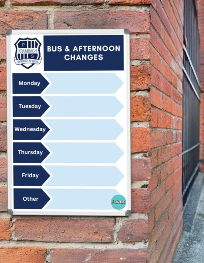 Printed school notice board with custom bus changes layout on a brick wall